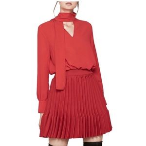 Maje Rivage red pussy bow pleated mini dress